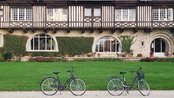 A Tudor-style building with a stone facade and timber framing.