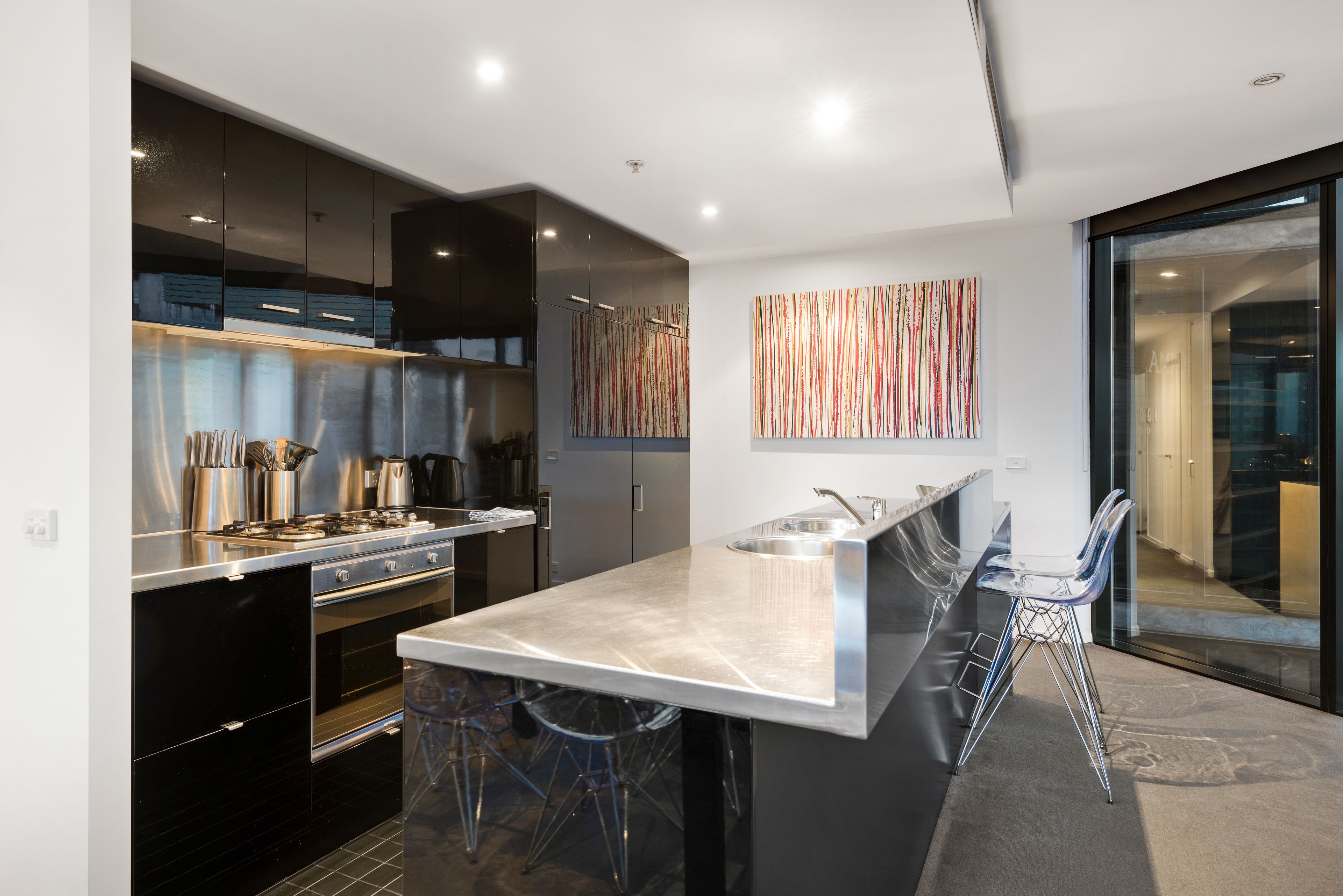 executive two bedroom apartment | private kitchen | full-sized fridge, microwave, stovetop, dishwasher