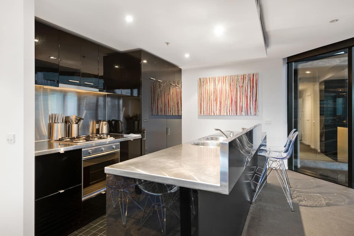 executive two bedroom apartment | private kitchen | full-sized fridge, microwave, stovetop, dishwasher