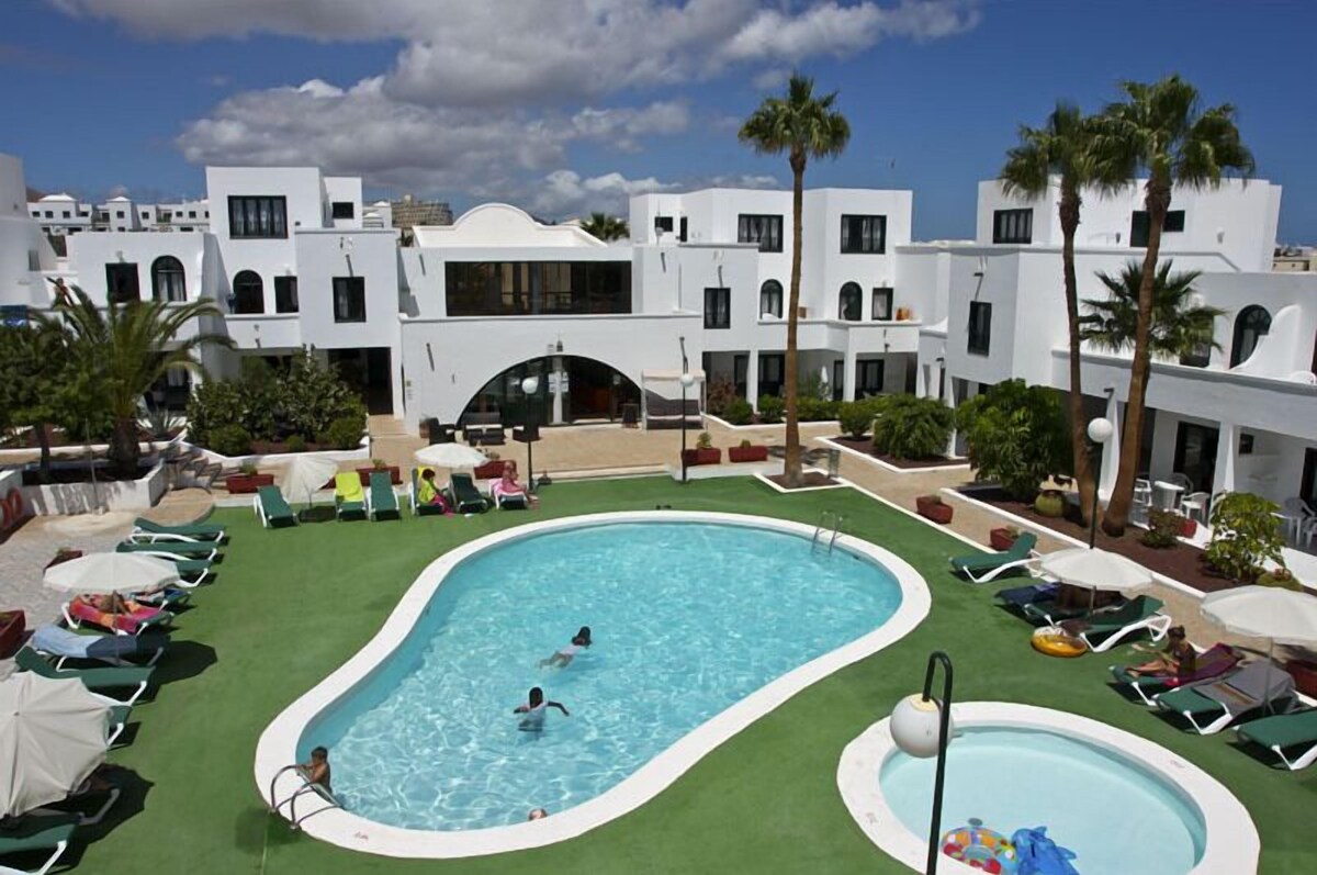Outdoor pool, pool umbrellas, pool loungers