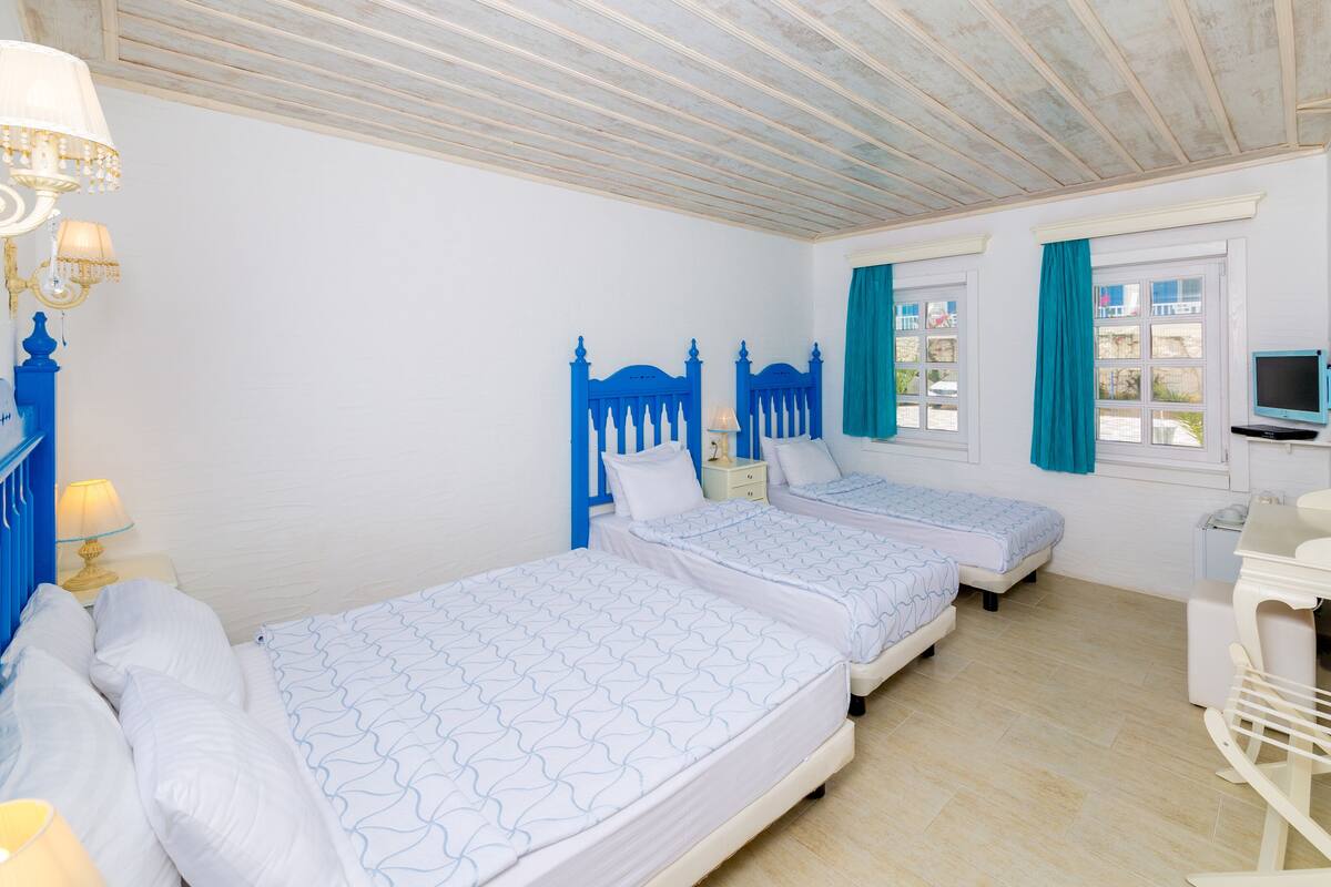 Family Quadruple Room | Premium bedding, Select Comfort beds, minibar, in-room safe