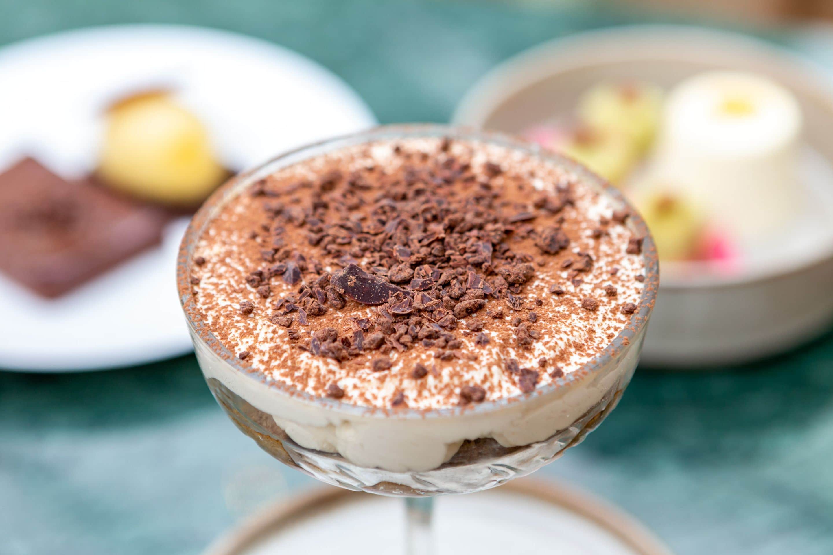 A dessert in a glass on a table.