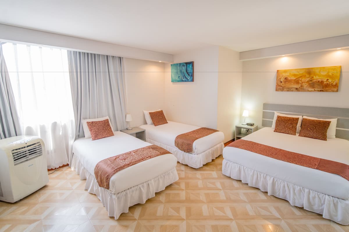 Quadruple Room, Multiple Beds, Private Bathroom | In-room safe, desk, iron/ironing board (on request), cribs (free)