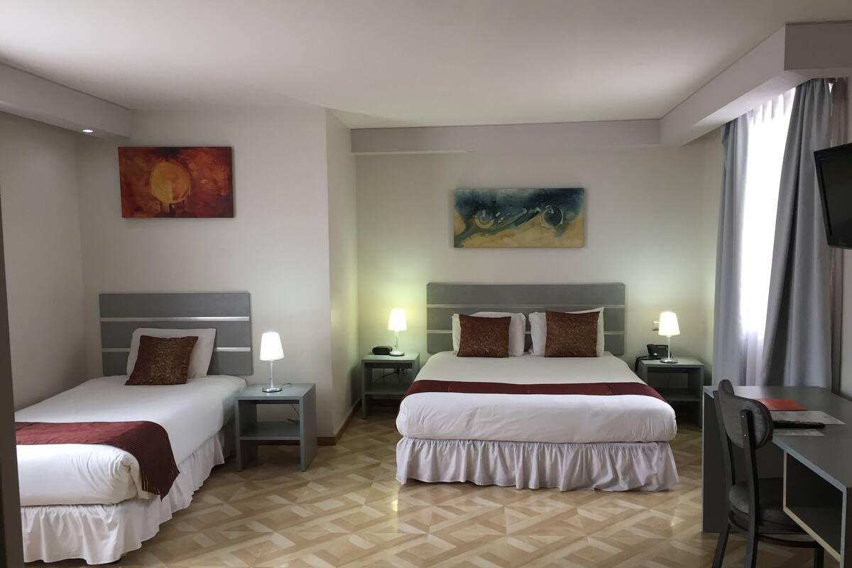 Triple Room, Multiple Beds, Private Bathroom | In-room safe, desk, iron/ironing board (on request), cribs (free)