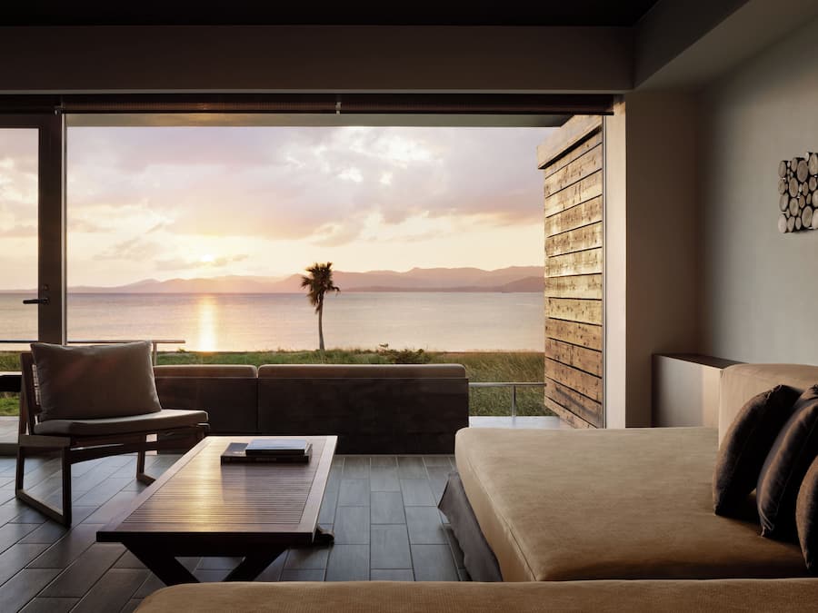 Ocean View Bath Suite | Down comforters, in-room safe, blackout drapes, iron/ironing board