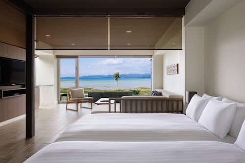Ocean View Bath Suite | Down comforters, in-room safe, blackout drapes, iron/ironing board