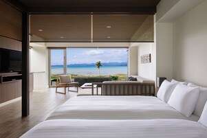 Ocean View Bath Suite | Down comforters, in-room safe, blackout drapes, iron/ironing board