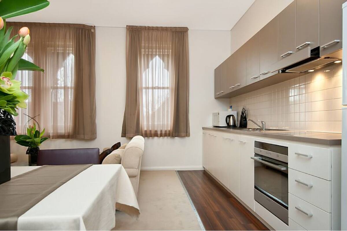 executive suite | 1 bedroom, in-room safe, desk, iron/ironing board