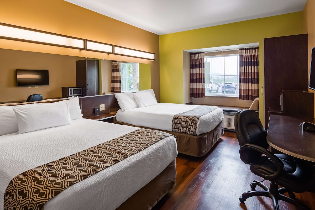 premium bedding, desk, laptop workspace, iron/ironing board