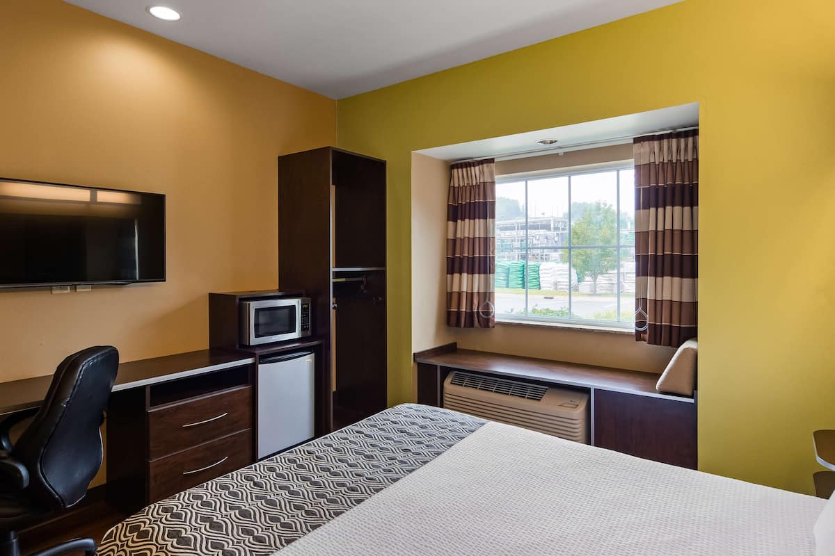 premium bedding, desk, laptop workspace, iron/ironing board