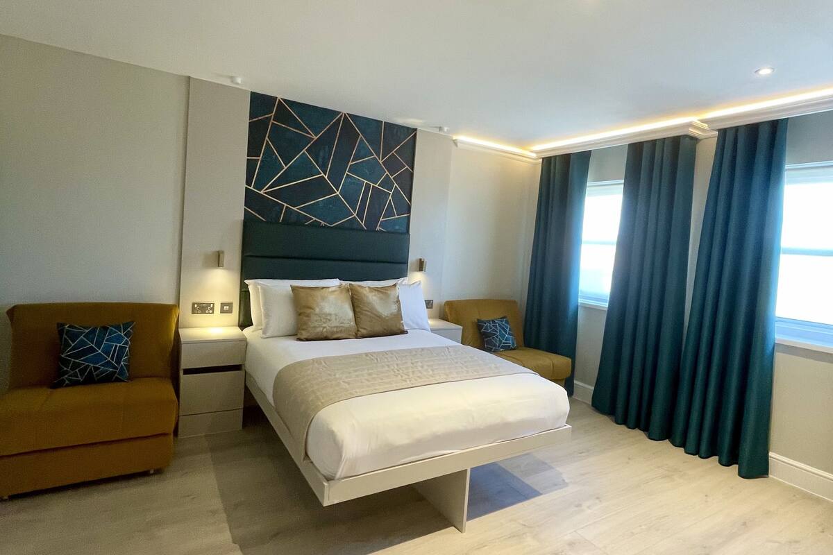 Departamento familiar | Ropa de cama de alta calidad y caja de seguridad en la habitación