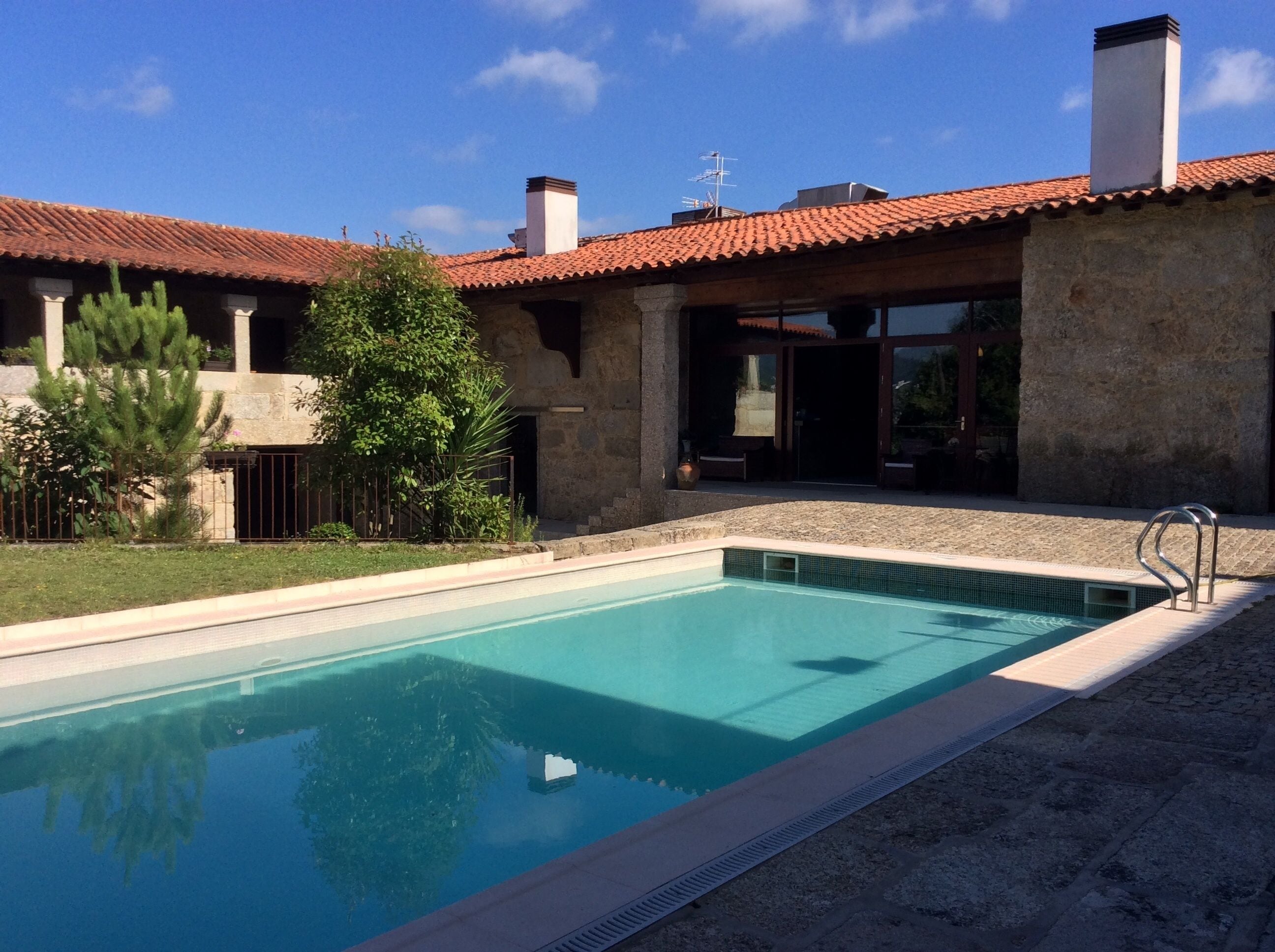 Seasonal outdoor pool, pool umbrellas