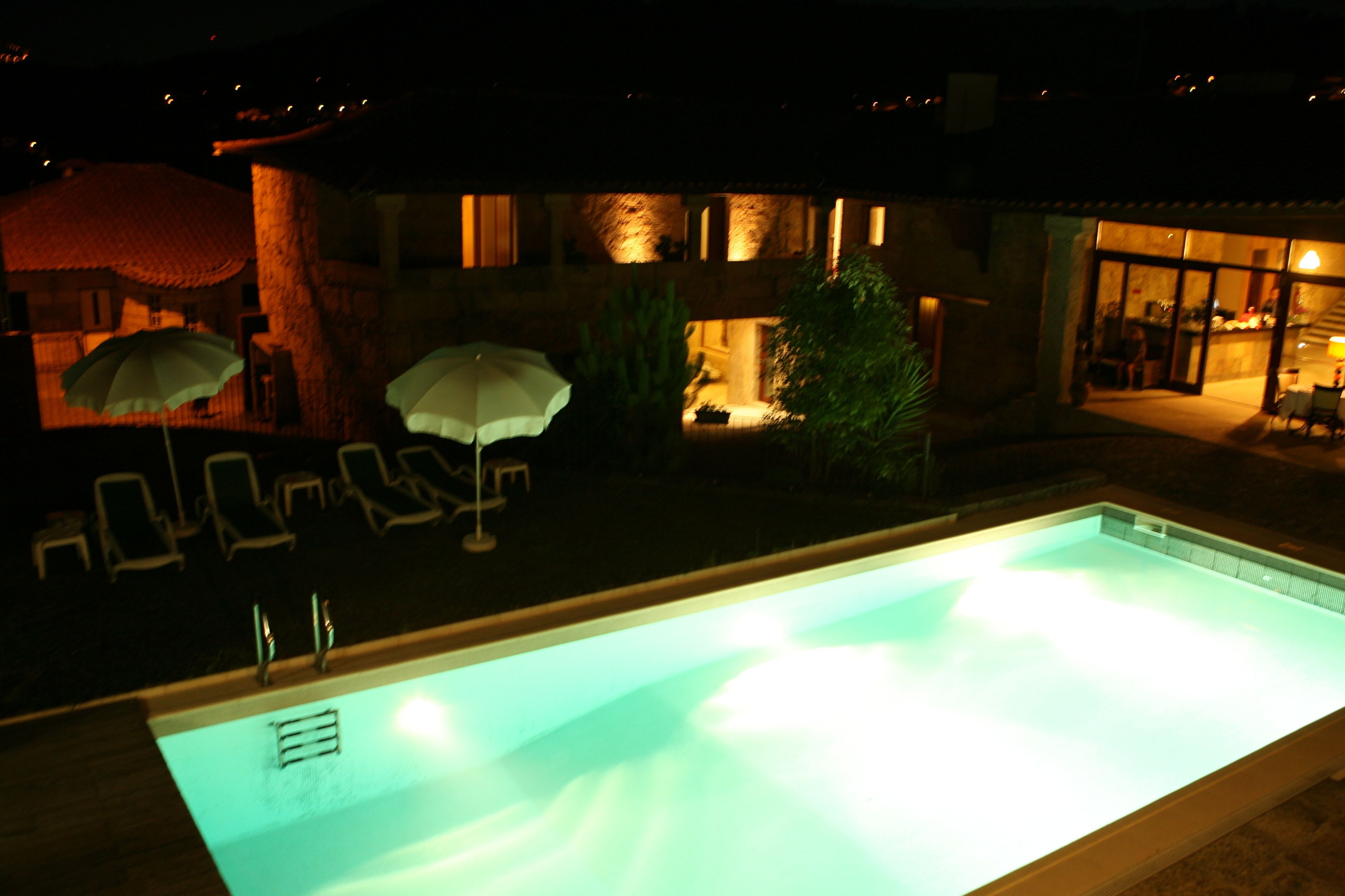 seasonal outdoor pool, pool umbrellas