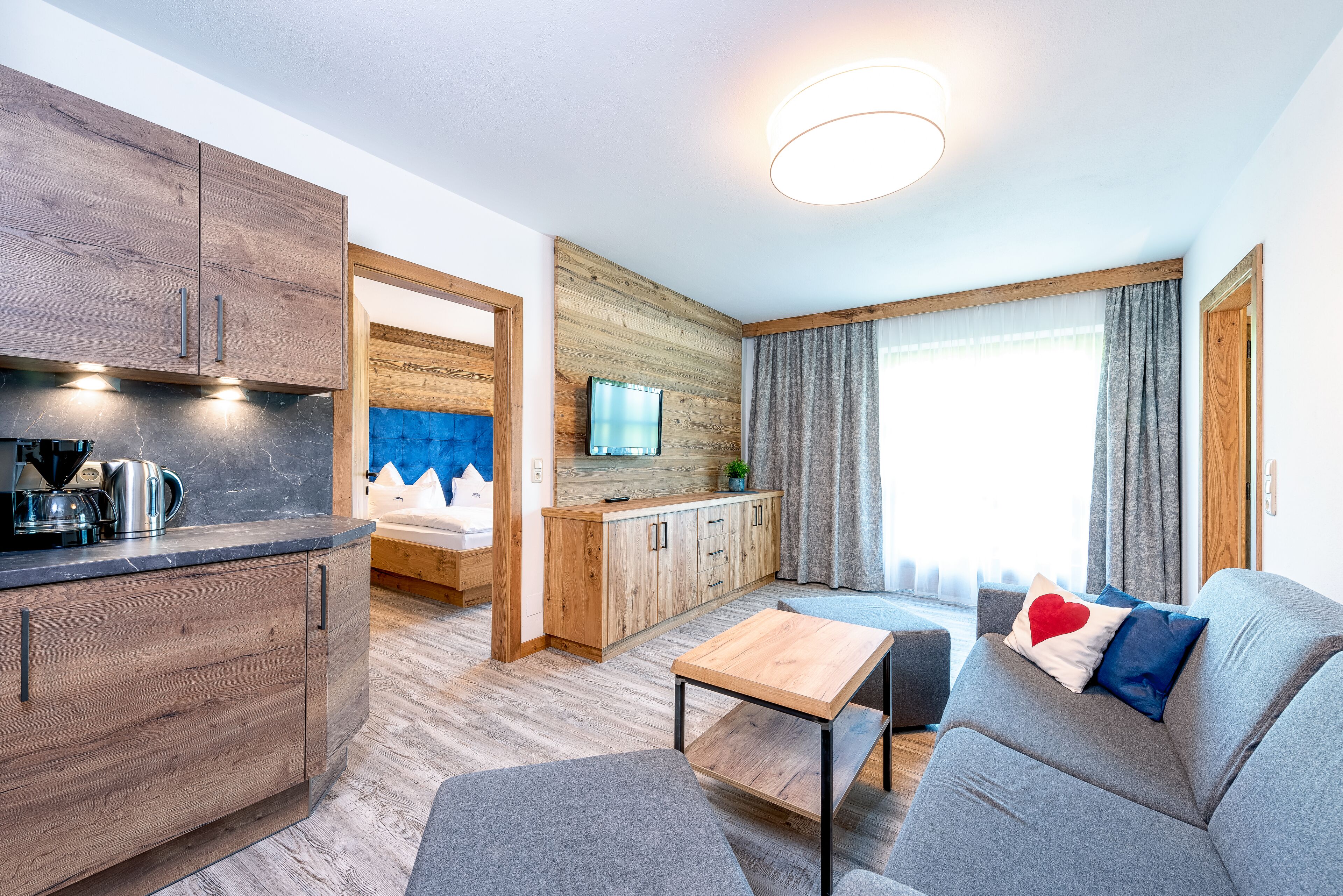 apartment stoa-g fühl | living area | flat-screen tv