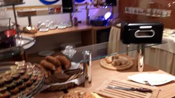 Daily self-serve breakfast (EUR 11.5 per person)
