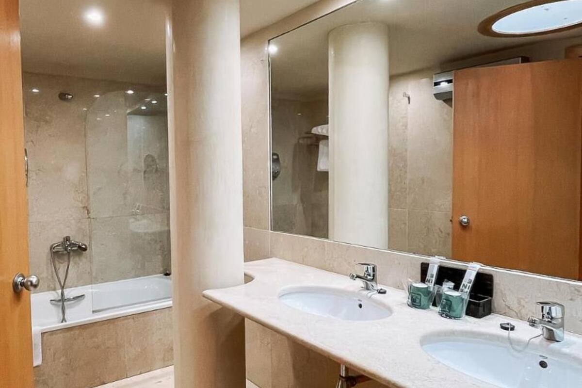 free toiletries, hair dryer, bidet, towels