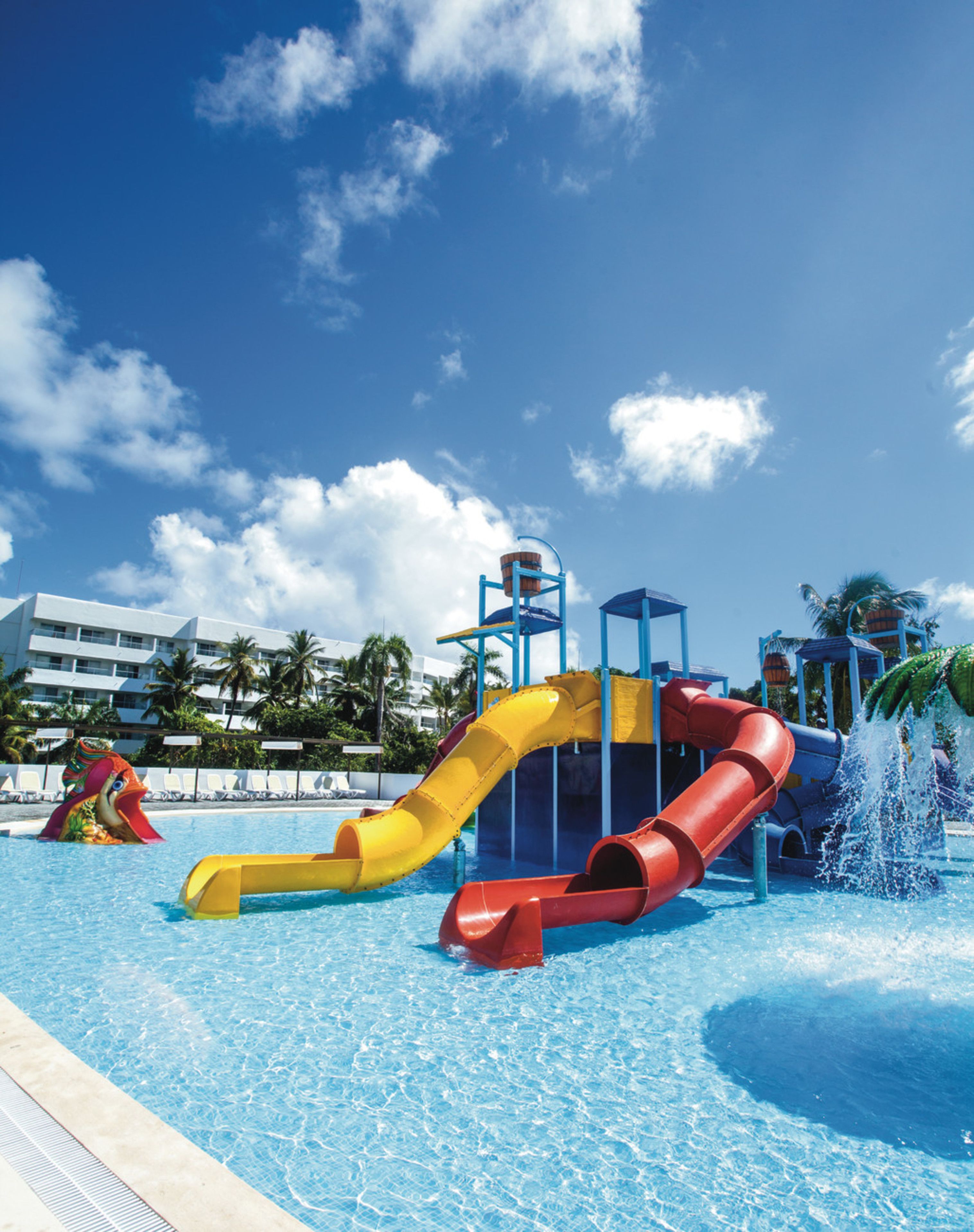 A water park with slides and a pool.