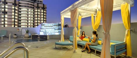 Outdoor pool, open 6:00 AM to 11:00 PM, free cabanas, sun loungers