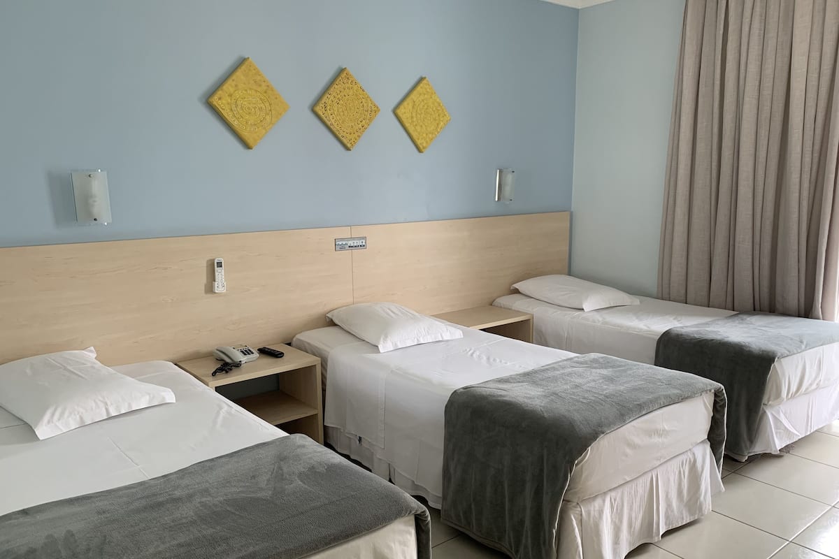Deluxe Triple Room, 3 Twin Beds | Minibar, in-room safe, desk, WiFi (free)