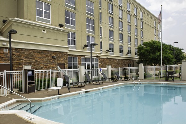 Seasonal outdoor pool, open 9:30 AM to 9:30 PM, pool umbrellas