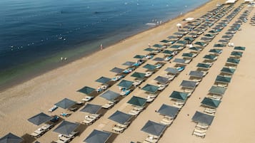Private beach, sun loungers, beach umbrellas, beach towels