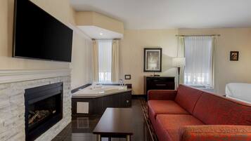 Suite, 1 King Bed, Non Smoking, Jetted Tub (with Sofabed) | Hypo-allergenic bedding, in-room safe, desk, laptop workspace
