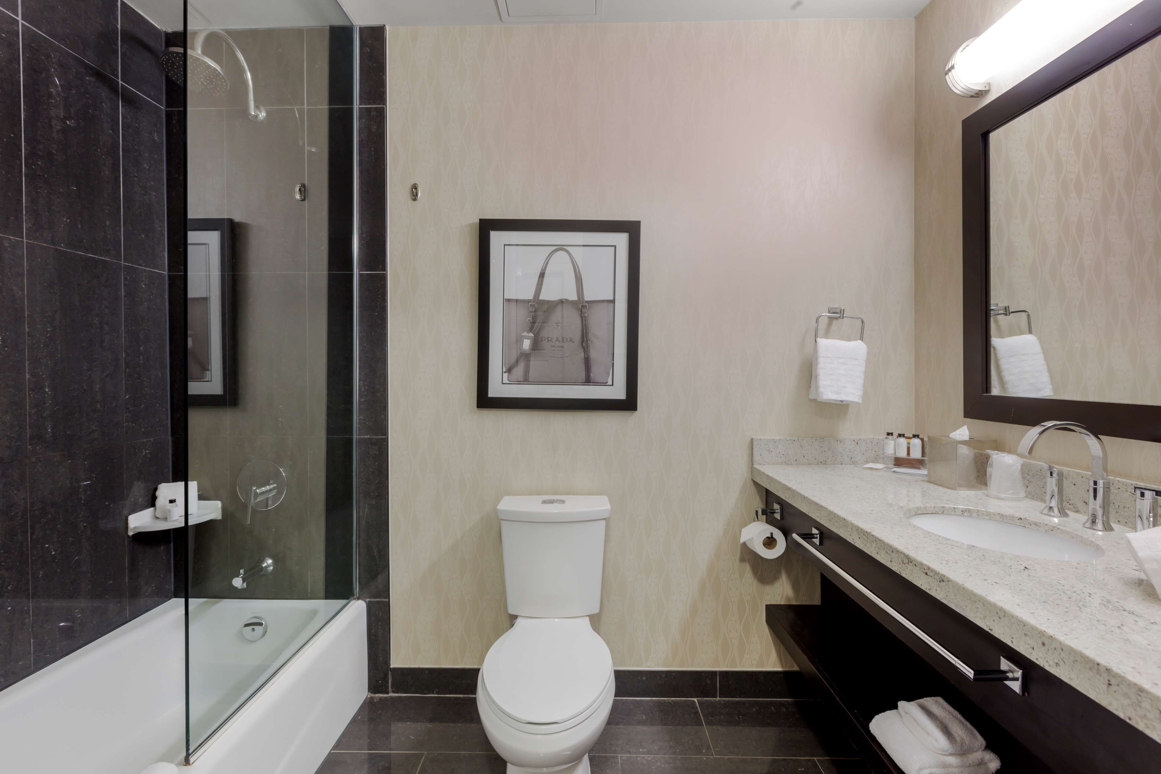 suite, 2 queen beds, non smoking, refrigerator & microwave | bathroom | shower, rainfall showerhead, free toiletries, hair dryer