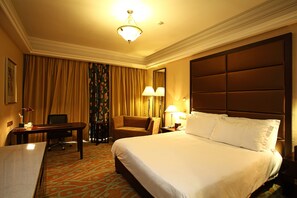 Premium bedding, pillow-top beds, minibar, in-room safe