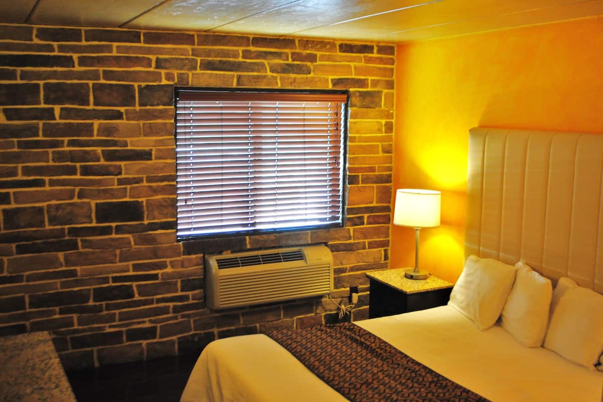 Chambre Deluxe, 1 trĂšs grand lit, fumeur