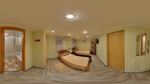 A room with two beds, a bathroom, and a hallway. - YELLOW UNLIMITED HOTEL 4 (Kharkiv)