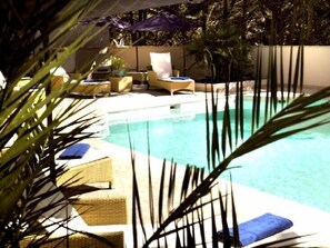 Outdoor pool, pool umbrellas, pool loungers