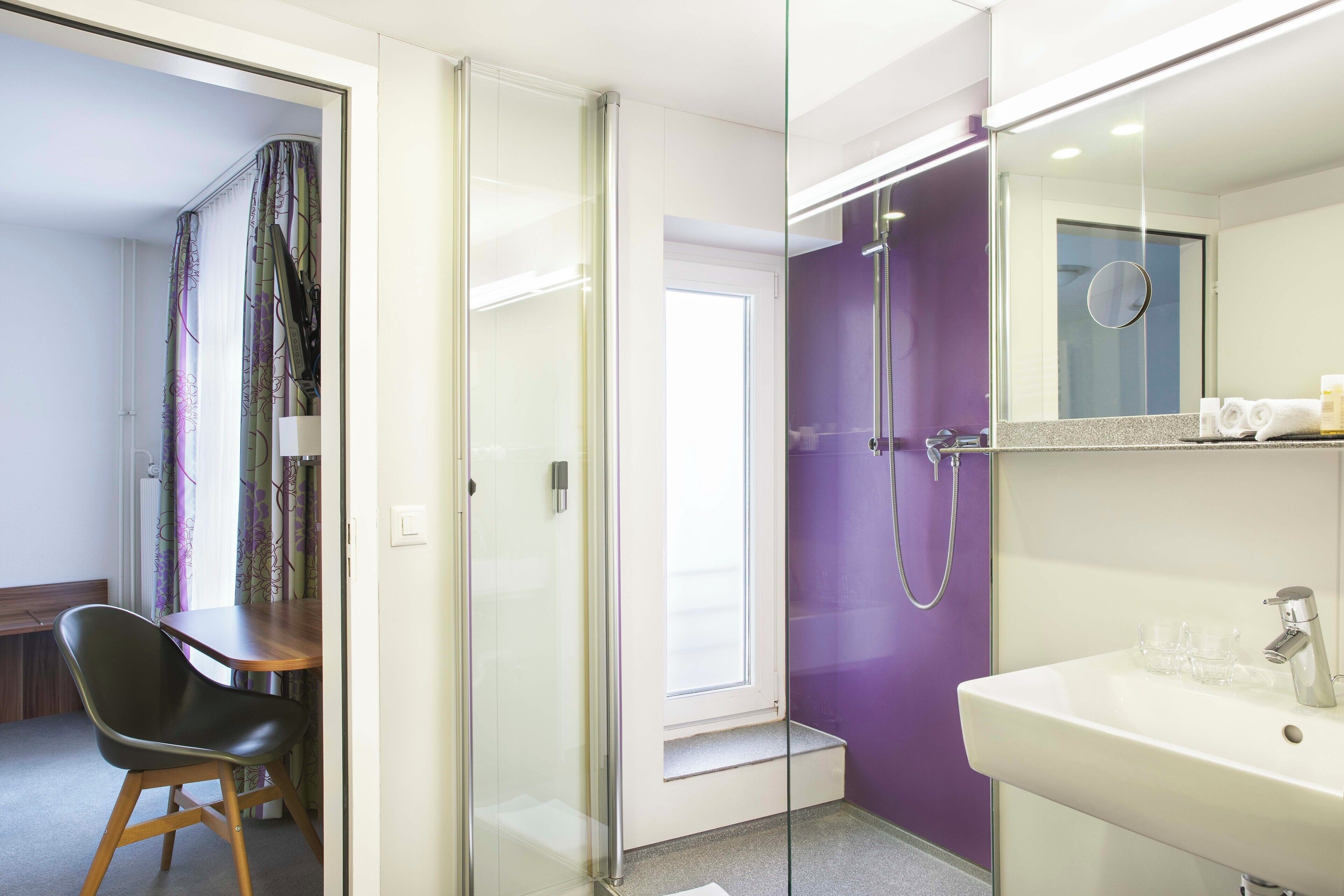 medium double room backyard | bathroom | shower, hair dryer, towels