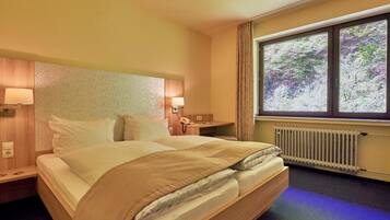 Luxe beddengoed, een minibar, individueel gemeubileerd, een bureau