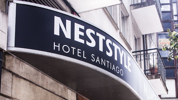 A hotel named Nestyle with a modern facade and a visible entrance. - Nest Style Santiago (Santiago de Compostela)