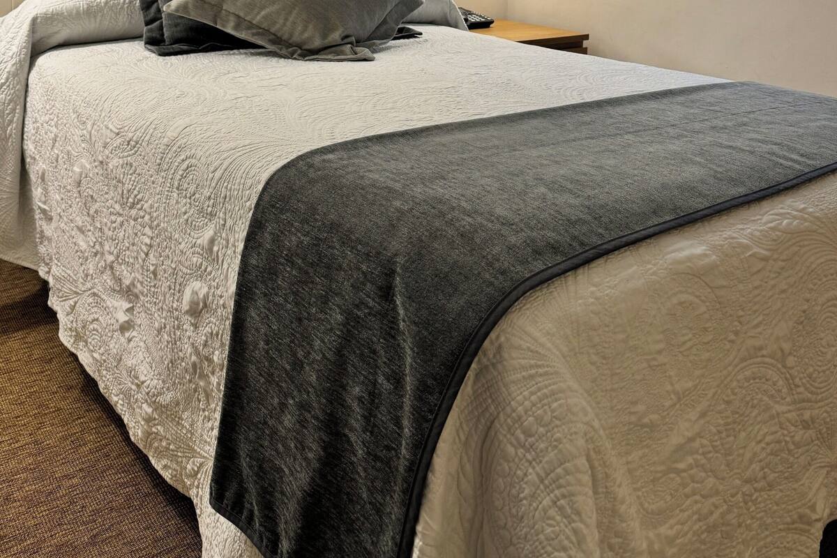 Premium bedding, desk, WiFi (free), bed sheets
