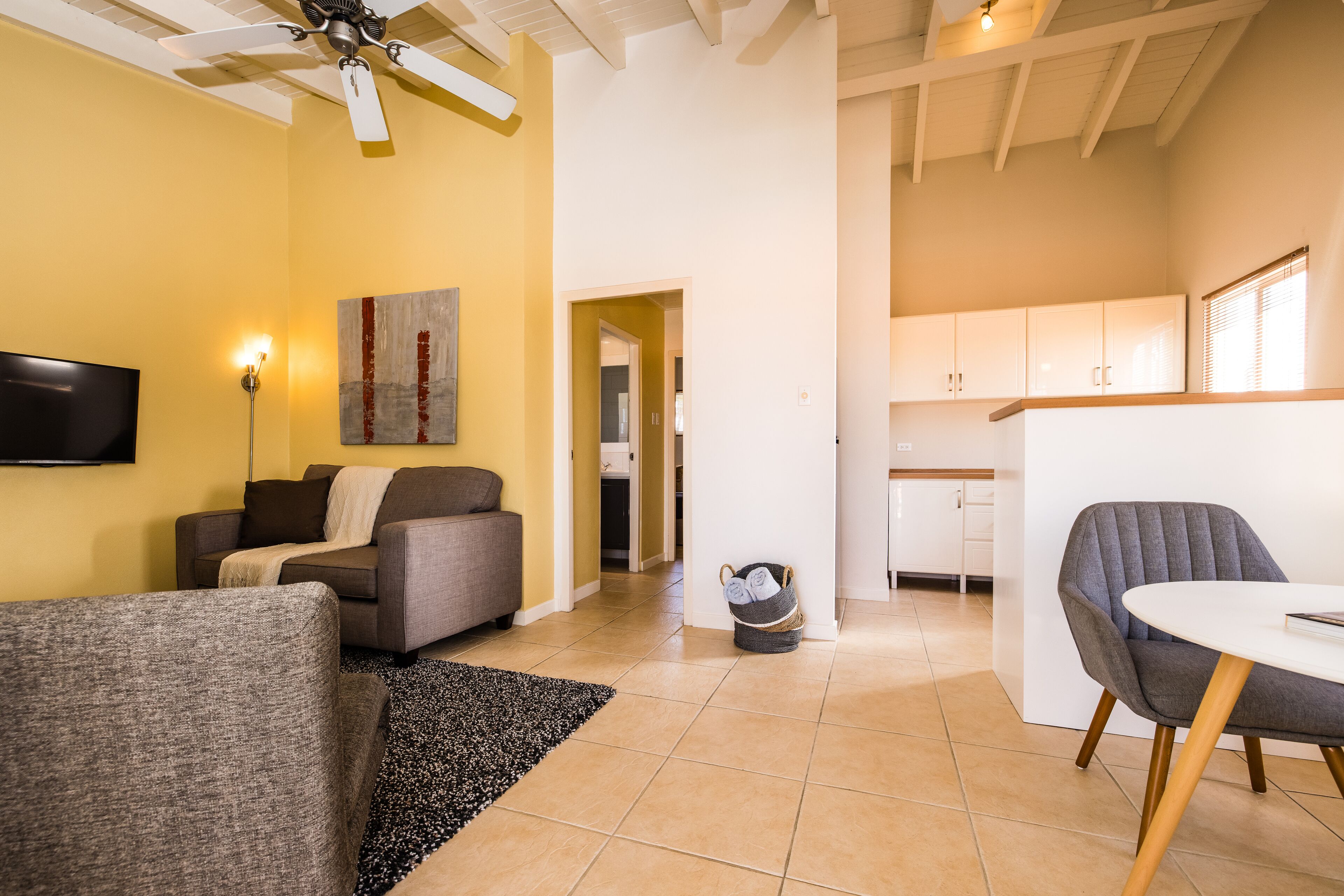 suite, 2 bedrooms | living room | 32-inch lcd tv with cable channels, tv, dvd player