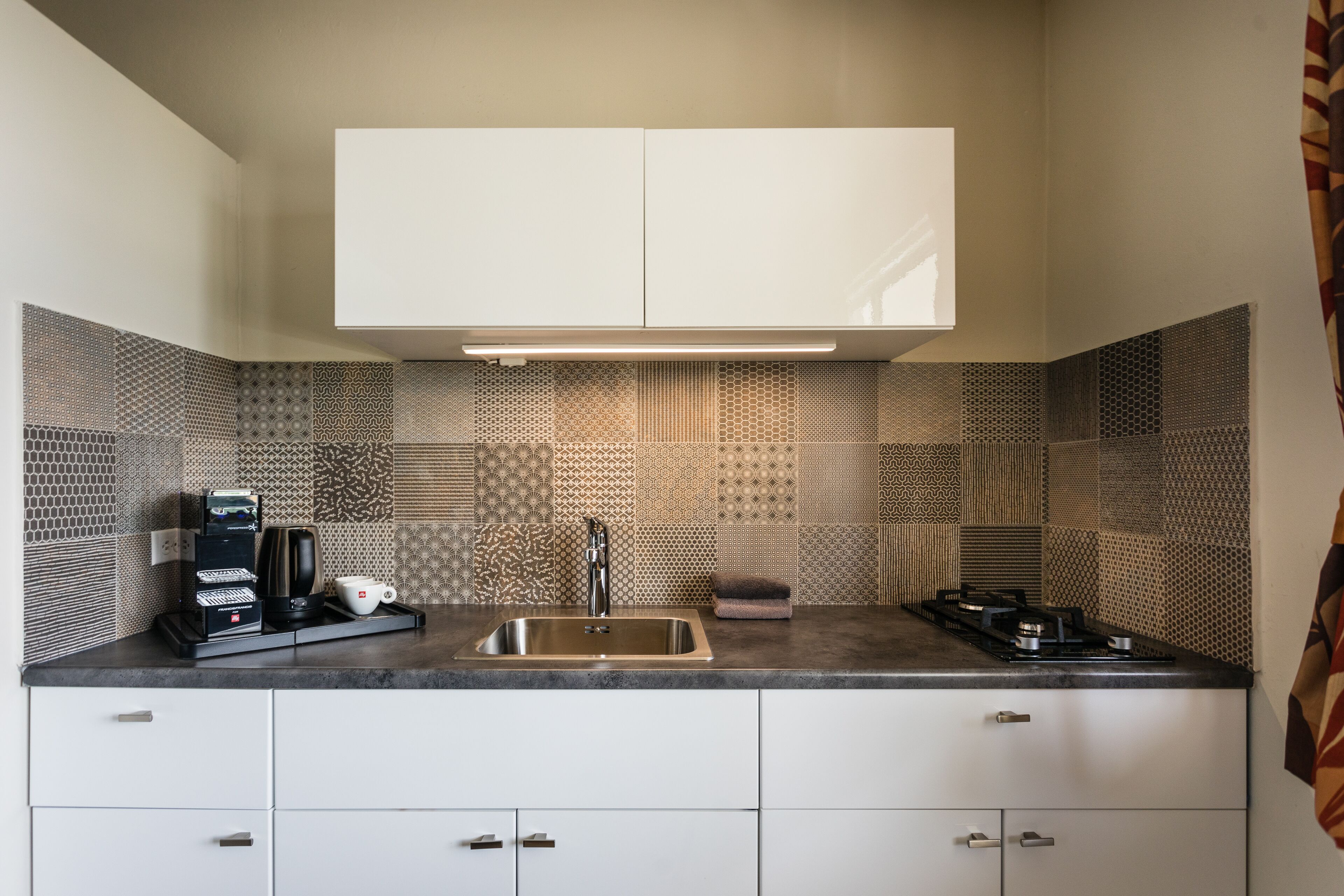 deluxe studio | private kitchen | full-sized fridge, microwave, stovetop, espresso maker