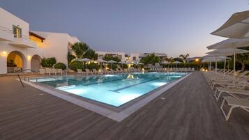 Seasonal outdoor pool, pool umbrellas, pool loungers