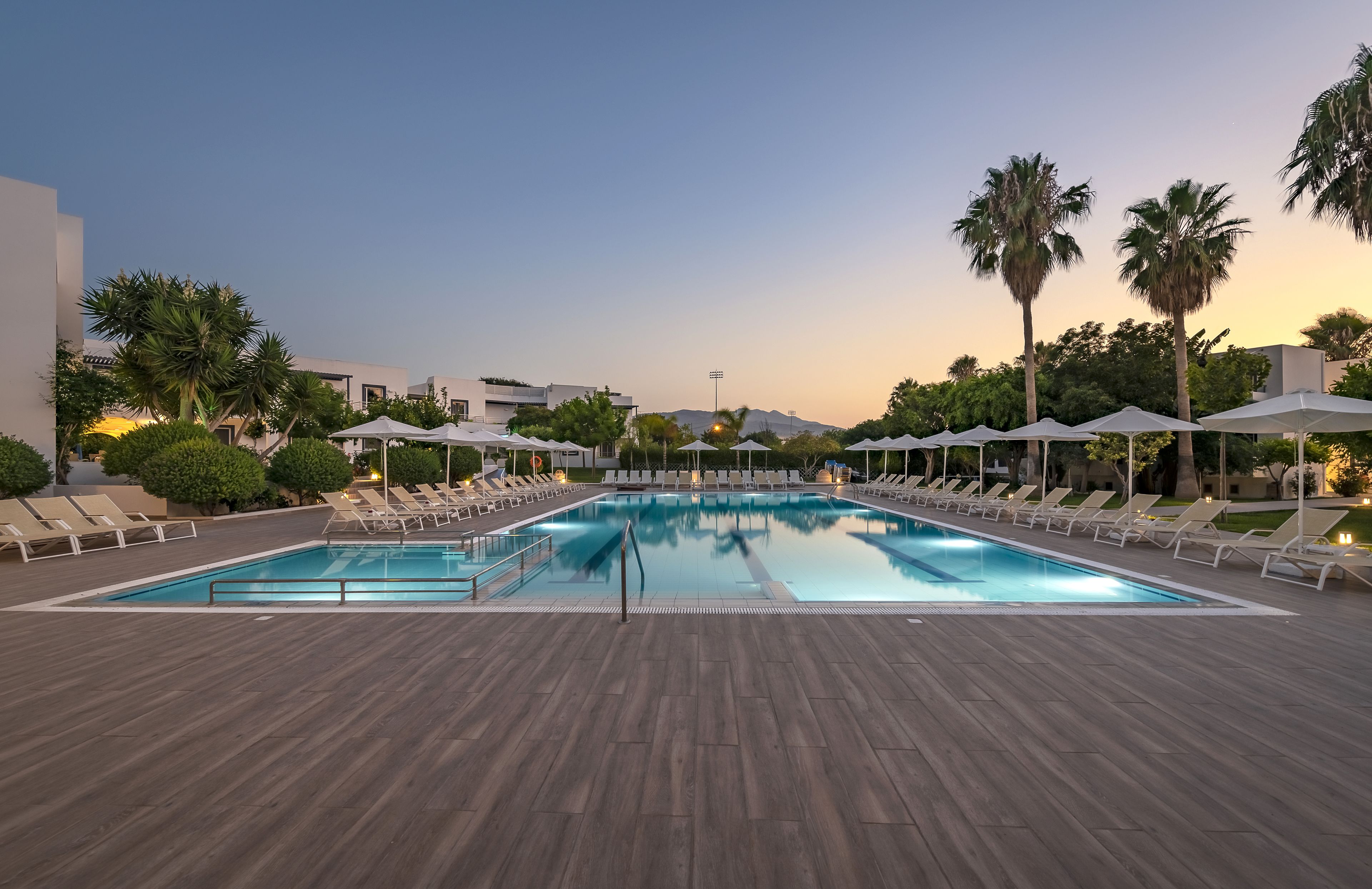 seasonal outdoor pool, pool umbrellas, pool loungers