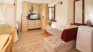 Studio Comfort, pemandangan kota | Ruang keluarga