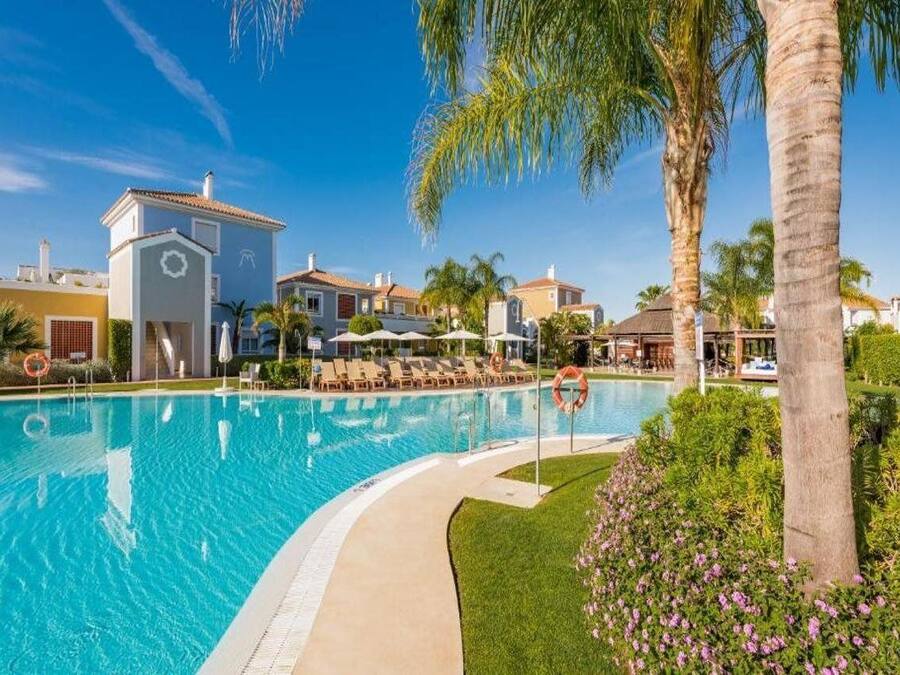 Seasonal outdoor pool, pool umbrellas, pool loungers