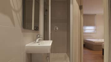 Shower, free toiletries, hair dryer, slippers