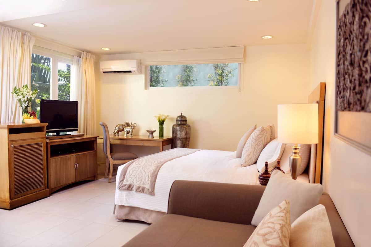Suite Deluxe | Coffre-fort, lit de bébé (gratuit), accès au Wi-Fi (inclus)