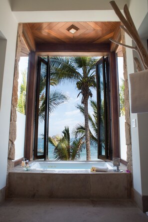 Premium bedding, down comforters, minibar, in-room safe