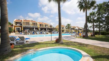 Outdoor pool, pool umbrellas, pool loungers