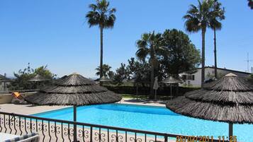 Outdoor pool, pool umbrellas, pool loungers