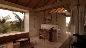 Una habitación con un ventanal grande, una mesa de madera, una silla y una lámpara colgante.