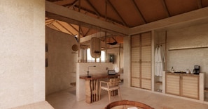 A rustic bathroom with a wooden vanity, a mirror, and a towel rack. - Blackberry Hills Munnar - Nature Resort & Spa (Devikolam)