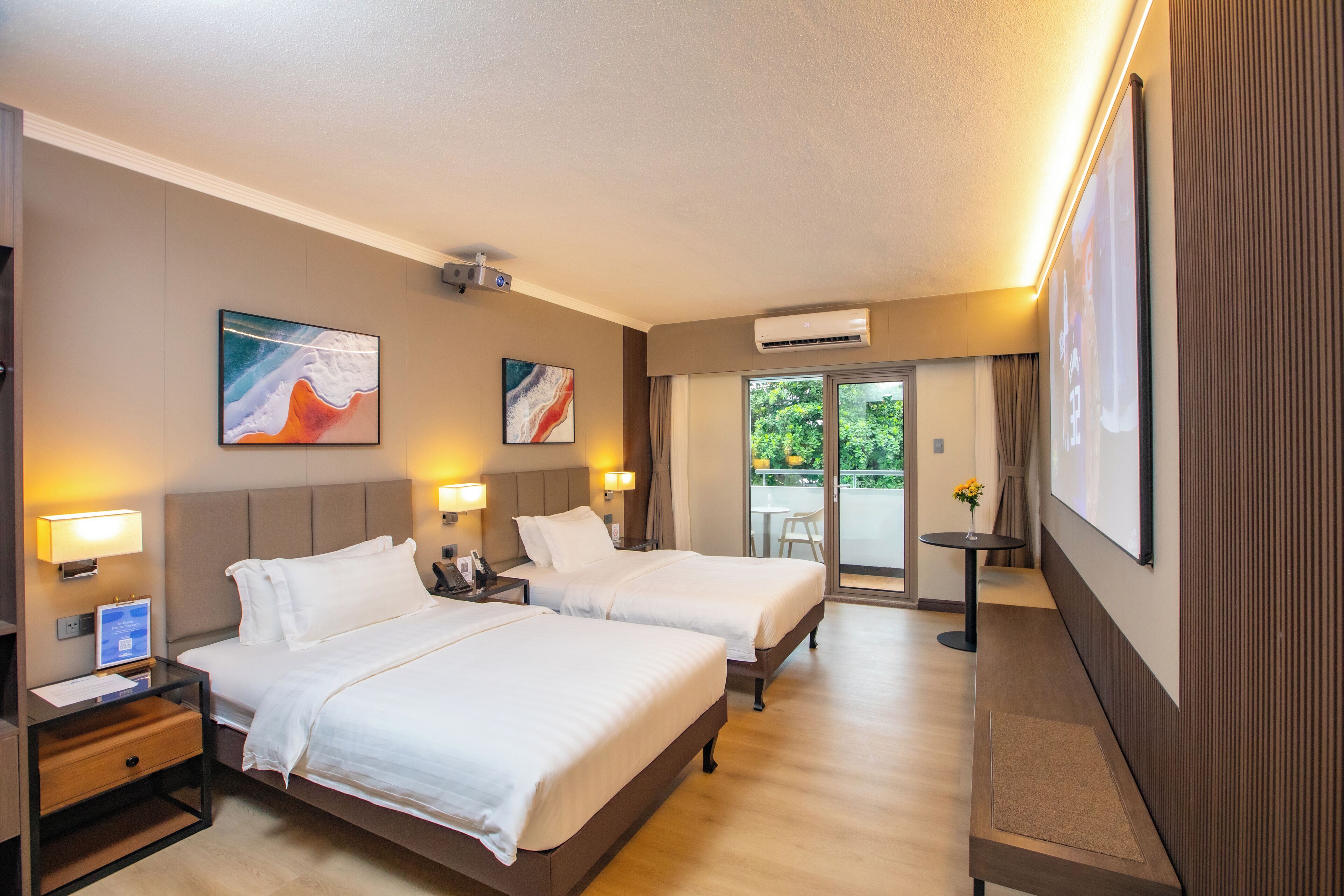 Premium bedding, laptop workspace, blackout drapes