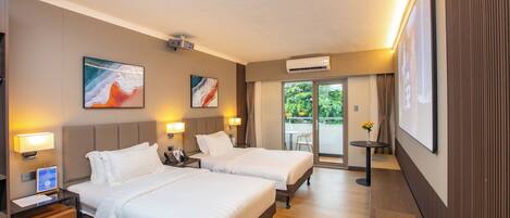 Premium bedding, laptop workspace, blackout drapes